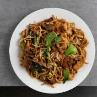 Zouji Stir Fried Noodle · Served with baby bok choy, black fungus, onions, carrots.