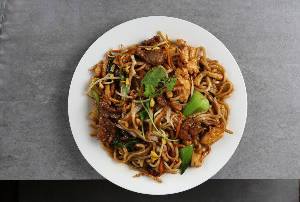 Zouji Stir Fried Noodle · Served with baby bok choy, black fungus, onions, carrots.
