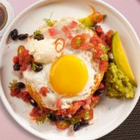 Jolly Rancheros · Lightly fried eggs served on a warm tortilla and topped with salsa, tomatoes, chili peppers,...