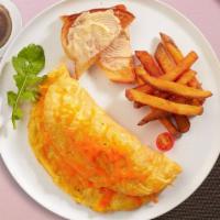 Say Cheese Eggs · Eggs cooked with loaded cheese as an omelet.