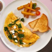 It'S All Greek Omelet To Me · Eggs, feta cheese, tomatoes, and onion.