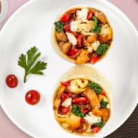 You Feta Believe It · Spinach, mushrooms, tomatoes, feta cheese, eggs, tomatoes and onions wrapped in a flour tort...