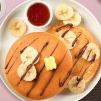 I'M Bananas For Nutella Pancakes · Fluffy banana nutella pancakes cooked with care and love served with butter and maple syrup....