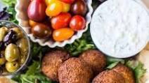 Falafel · Croquettes of ground chickpeas and spices served with tahini sauce.