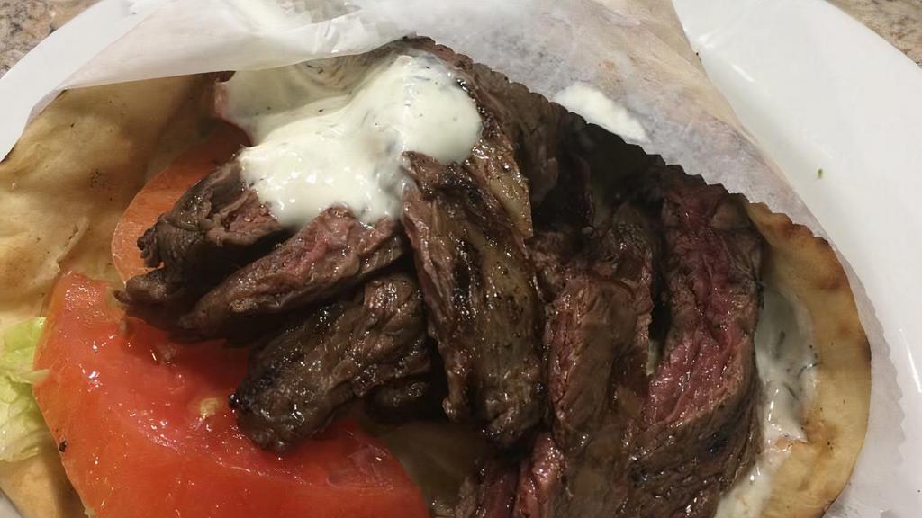 Skirt Steak Sandwich · Served with lettuce, tomato, onions and tzatziki sauce.