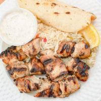 Chicken Souvlaki Platter · Marinated grilled chicken cubes. Served with Greek salad or soup and choice of rice, lemon p...