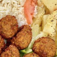 Falafel Platter · Croquettes of spicy ground chickpeas, served with tahini sauce.