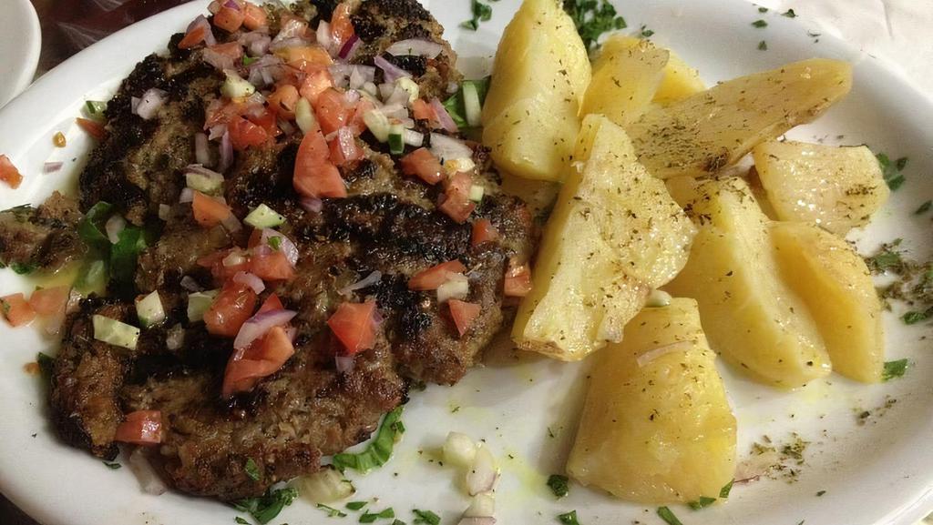 Bifteki Platter · Chopped beef with Greek seasoning and herbs.