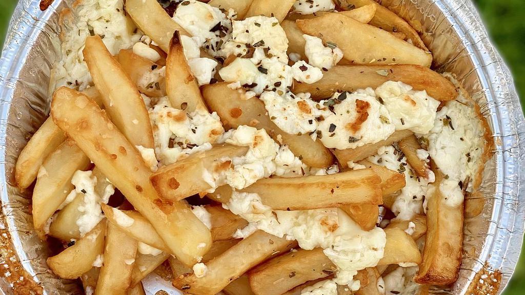Greek Fries · French fries with seasoned feta cheese and oregano. Add diced tomato for an additional charge.