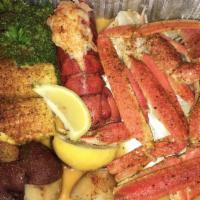 Combo J · 1 cluster of snow crab legs and 1 lobster tail comes with red potatoes, 2 pieces of corn, an...