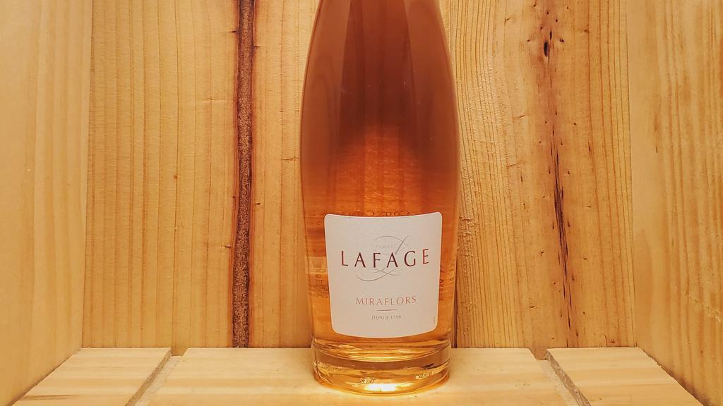Domaine Lafage Miraflors Rose 2021 | 750Ml · Named after an old estate located in the heart of Domaine Lafage, Mas Miraflors, the Miraflors Rosé is sourced from old vines of Grenache Gris and Noir, some nearing 80 years old, planted near the Mediterranean. Added to this is some Mourvedre that Jean-Marc planted here about 15 years ago. This a direct press rosé with the color coming from the skins of the pink Grenache Gris berries, and naturally, from the much darker Mourvedre and Grenache Noir. It is aged in tank for 4 months before bottling.