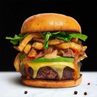 Freaky Fryday Burger · American beef patty topped with fries, avocado, caramelized onions, ketchup, lettuce, tomato...