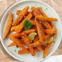 Sweet Potato Fries · (Vegetarian) Thick-cut sweet potato wedges fried until golden brown