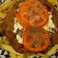 Argentina  Milanesa Napolitana With Fries · BEEF OR CHICKEN MILANESA , MELTED MOZZARELLA CHEESE OVER A MARINARA SAUCE, SLICED HAM AND FR...