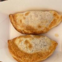 Empanadas Argentinas · Traditional homemade argentinian turnover. Choice of: beef, chicken, ham and cheese, spinach...