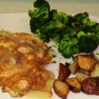 Francese · Battered veal cutlet sauteed in a white wine and lemon butter sauce.