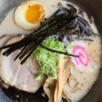 Tonkotsu Ramen · Thin noodles in our special rich, milky, chicken and pork bone broth topped with braised por...