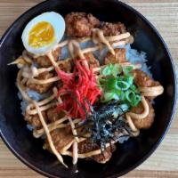Chicken Karaage Rice Bowl · Asian style chicken nugget seasoned with ginger, garlic, soy sauce, together with half boile...