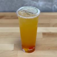 Fruit Tea · Flavored Green Tea with fruit jelly, photo showing passion fruit flavor.