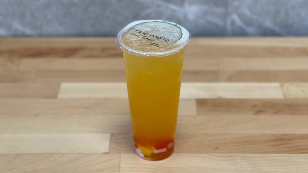Fruit Tea · Flavored Green Tea with fruit jelly, photo showing passion fruit flavor.