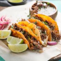 Birria Tacos · Comes with 3 Tacos and Broth.