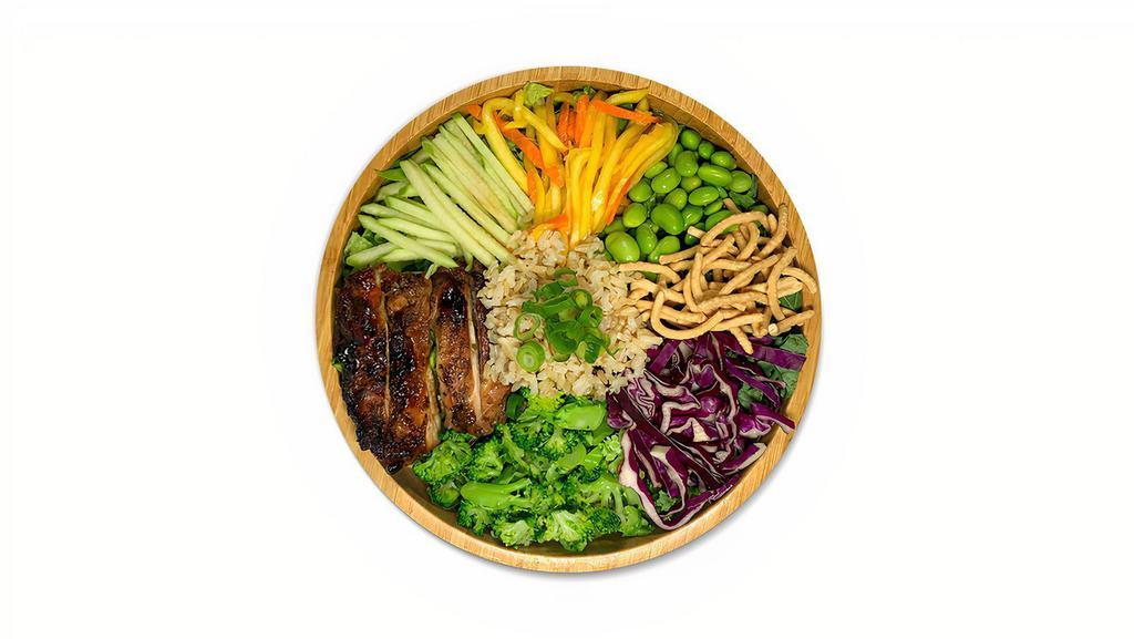 Honey Teriyaki Chicken · Honey teriyaki chicken, chopped romaine, shredded kale, warm herbed brown rice, red cabbage, apples, roasted sweet potatoes, steamed broccoli, edamame, mango salad, scallion, crispy noodle, apple carrot ginger dressing.