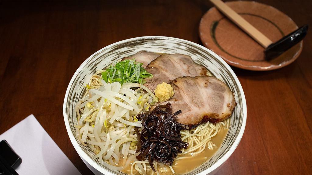 Classic Tonkotsu · 18 hour pork broth with garlic shoyu, thin or thick noodle, pork chashu, scallion, wood ear mushroom, ginger, seabura.