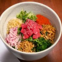 Crunch Poke Bowl · Tuna and salmon, seasoned rice, kale, caviar, seaweed salad, daikon cress, red radish, assor...