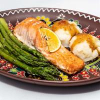 Baked Salmon · Served with asparagus and golden mashed potato.