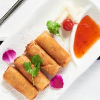 Spring Roll · Spicy yellowtail and crunch inside, topped with yellowtail and scallion.