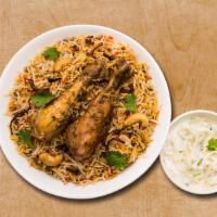 Chicken Biryani Theory · Aromatic rice cooked with chicken tenders, Indian spices, and herbs. Served with lightly spi...