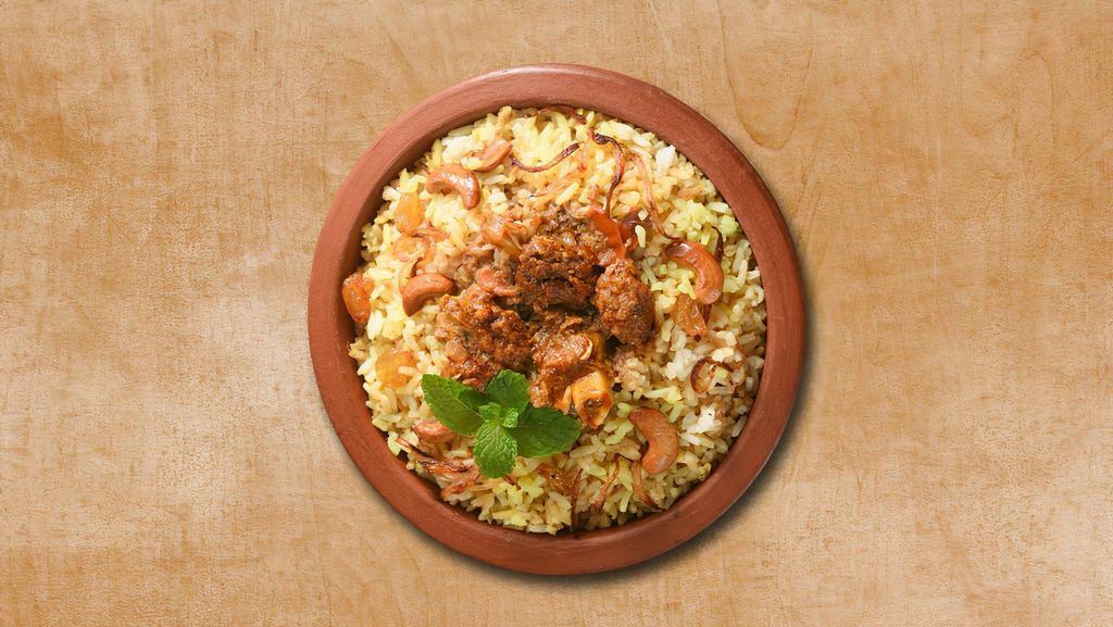Lamb Biryani Theory · Aromatic rice cooked with pieces of lamb, Indian spices, and herbs. Served with lightly spiced curry and raita.