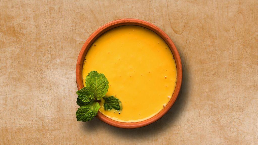 Flavored Mango Lassi · Flavored mango yogurt drink in Indian style.