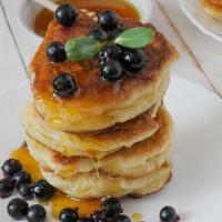 Fresh Blueberry Pancakes · 3 classic fluffy homestyle buttermilk pancakes dusted loaded with fresh juicy blueberries! S...