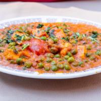 Mattar Paneer Ala Carte · Vegetarian. Cheese and peas cooked in spices. Served with pillaw rice, dhal and onion chutney.