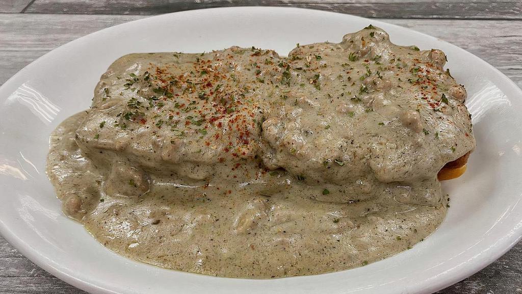 Skeeter'S Biscuits & Gravy · House-baked biscuits smothered with house-made pork sausage gravy
