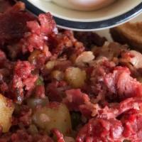 House-Made Corned Beef Hash · Regular OR spicy! Add eggs for $1/each.