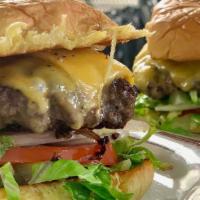 Classic Hamburger · Served with lettuce, tomato, onion. Make it a cheeseburger +$1. Additional toppings for extr...