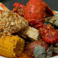 The Cajun Seafood Specialty · Seafood boil made exactly as you want it. Pick 3 seafood boil, tossed in flavorful seasoning...