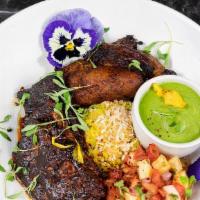 Jerk Tofu Bowl (Gf) · grilled jerk tofu, coconut herb sauce, coconut rice, fried plantains, toasted coconut pineap...