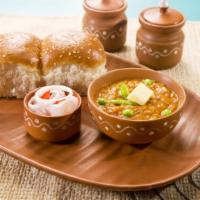 Pav Bhaji · Seasonal vegetables and potatoes spiced and mashed on a flat tawa to perfection, served with...