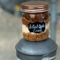 Fried Applecrumb Cheesecake Jar - 8 Oz. · Our signature cheesecake layered with fried apple and crumb  in a reusable 8 ounce jar. Pric...