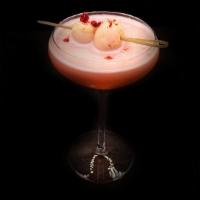 Lychee Berry Martini · tito's vodka, cointreau, lychee juice, muddled raspberry