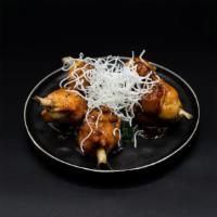 Angry Chicken Lollipops · fiery sesame hoisin sauce & flaky rice noodles