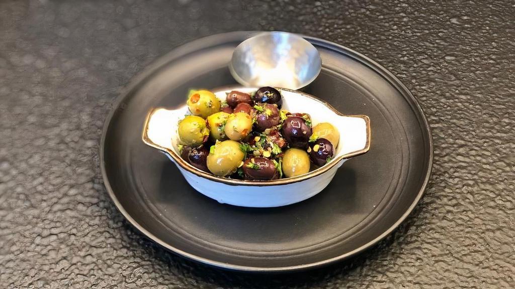 Mixed Marinated Olives (Vt) · herb infused evoo