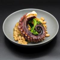 Grilled Spanish Octopus · spicy Spanish adobo marinated octopus served with white beans sauce, crispy pee wee potatoes...