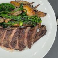 New York Strip Steak · 10 oz. New York Strip Steak with deep fried baby potatoes sautéed  sweet broccolinis and del...