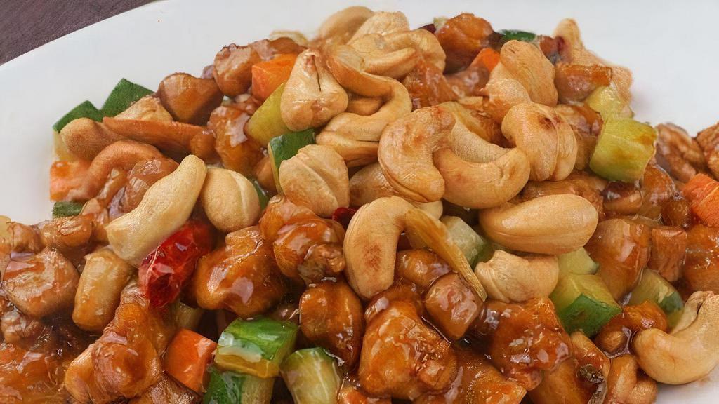 Chicken With Cashew Nut · Served with white rice.