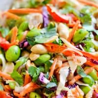 Asian Salad · Choice of greens, shredded cabbage, edamame, shredded carrots, almonds, and wonton chips, to...