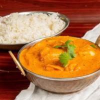 Chicken Tikka Masala · Pieces of marinated chicken baked in a tandoor, then sauteed creamy sauce with tomatoes, oni...